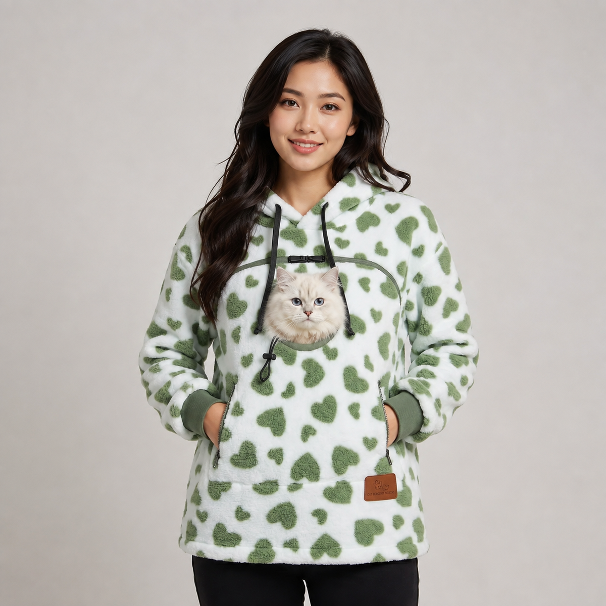 CozyPaw hoodie in Sage Hearts with a cat in the pouch